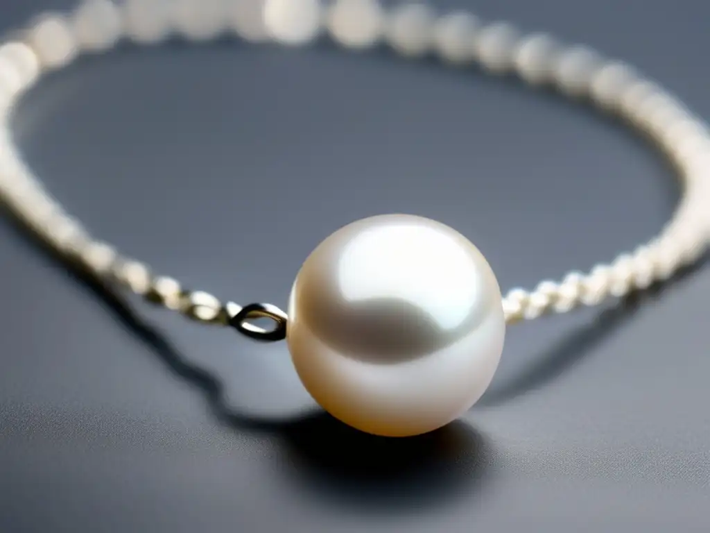 Joyería: simbolismo perlas agua dulce - Elegante perla blanca en cadena plateada